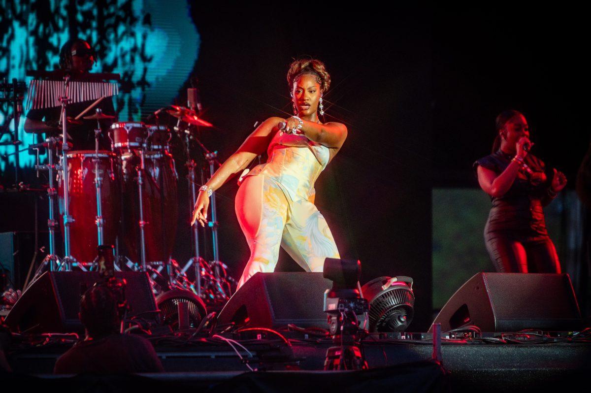 Tems dances during her set at the final Dreamville Festival in Dorothea Dix Park on April 6, 2025. Tems was the first Nigerian artist to debut At #1 on the Billboard Hot 100.