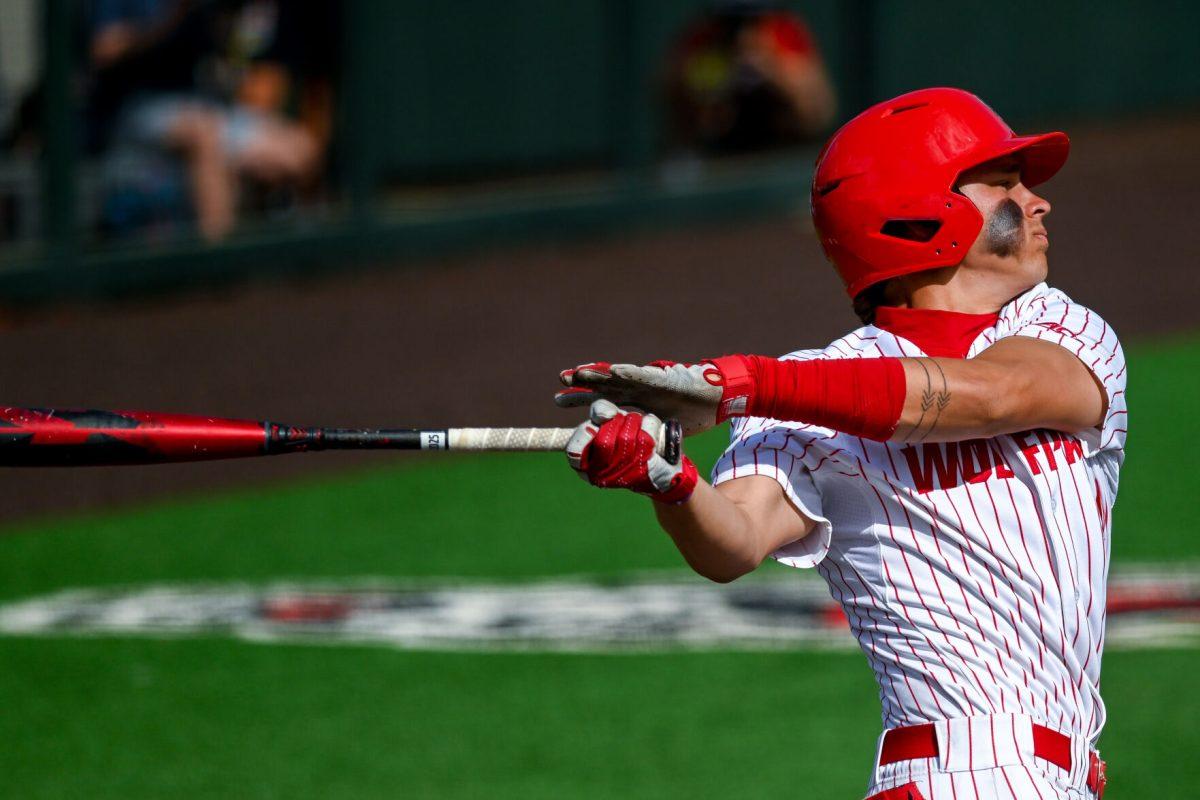 Freshman outfielder Ty Head swings his bat during the game against Virginia on April 5, 2025 at Doak Field at Dail Park. Head had one hit and two RBIs. NC State bested Virginia 9-2.