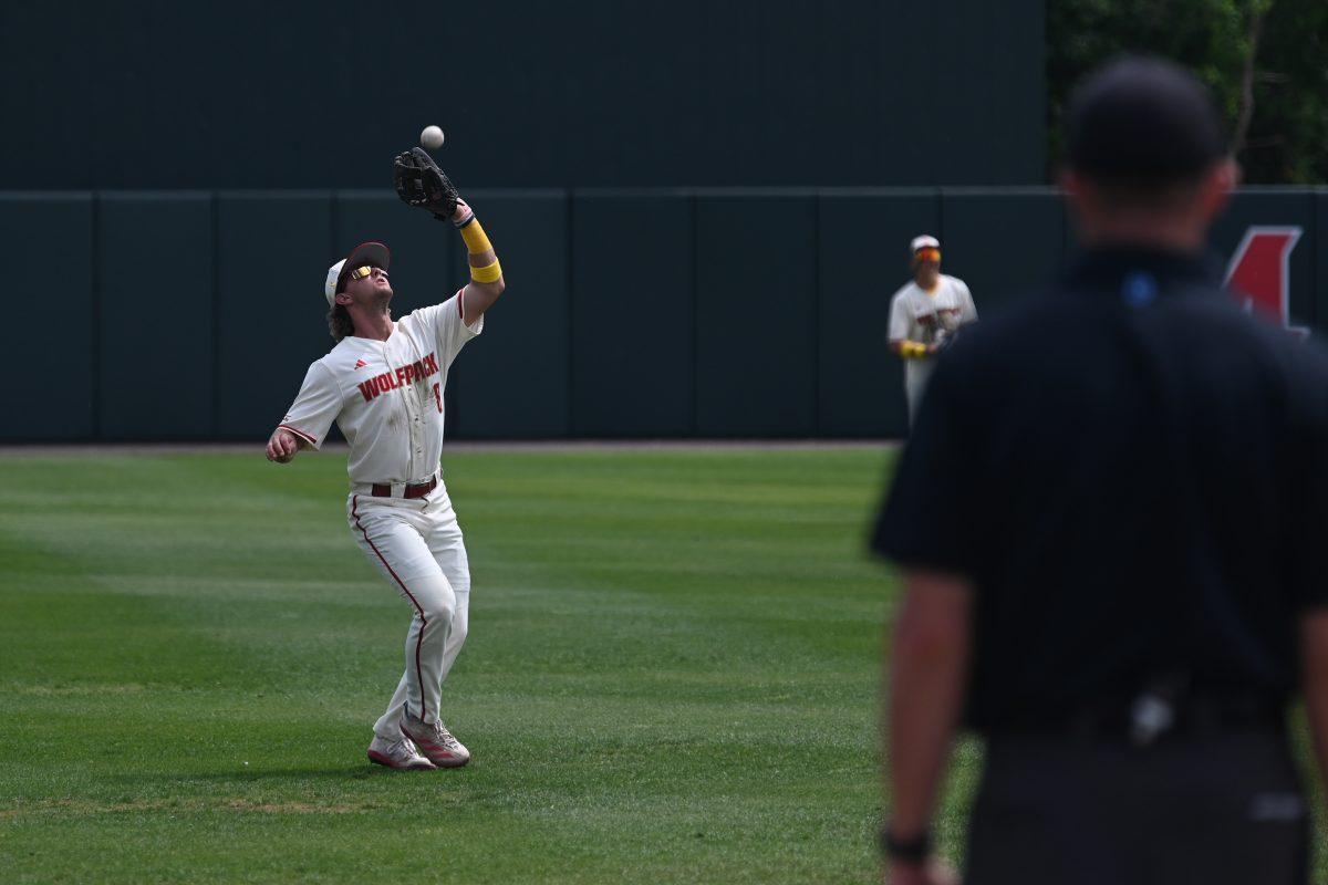 Senior infielder Justin DeCriscio makes the catch on a shallow outfield popfly during the Wolfpack's home game against the Clemson TIgers on Doak Field at Dail Park on April 26, 2025. The Wolfpack beat the number two ranked Tigers 4-1 to complete the series sweep on the second annual Victory Over Cancer Game.