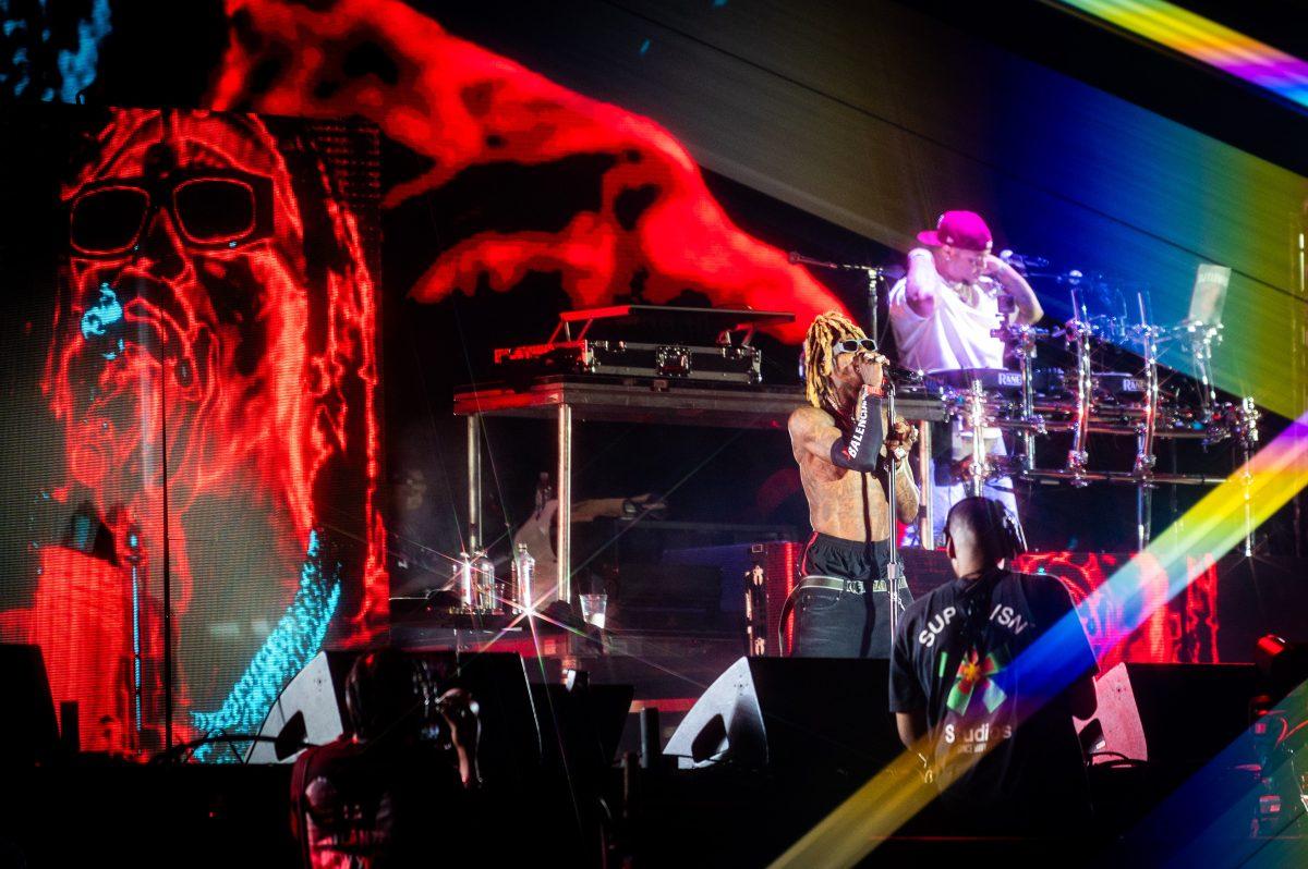 Lil Wayne performs during the final Dreamville Festival in Dorothea Dix Park on April 5, 2025. Wayne wore outfits supporting North Carolina teams like the Carolina Hurricanes during his show.