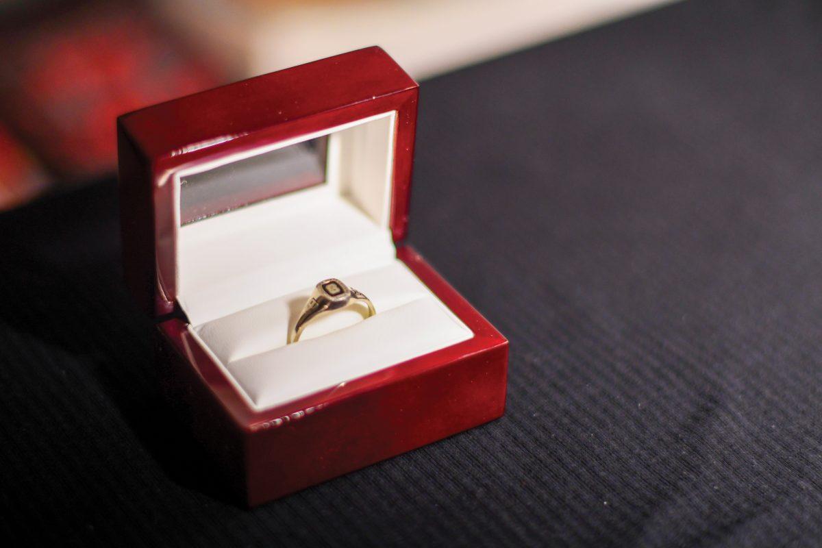 A class ring sits perched in its case in an apartment near Centennial Campus on Monday, April 14, 2025. Balfour, the company that sells NC State class rings, also sells NC State's official yearbook, graduation announcements and diploma frames.
