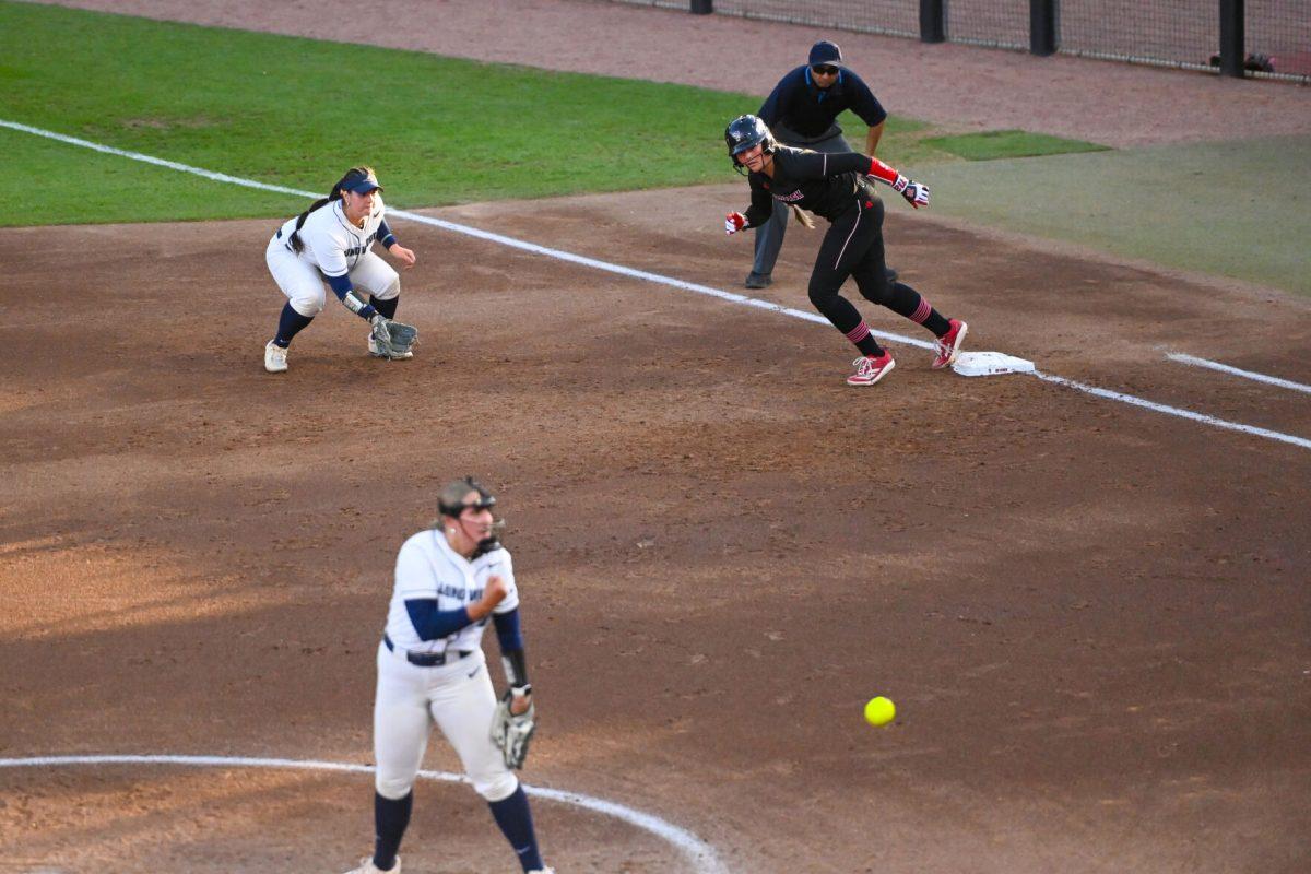 Junior outfielder Ellie Goins begins to run during the second game of the doubleheader against Longwood at Dail Softball Stadium on Tuesday, April 15, 2025. NC State won the game 7-0.