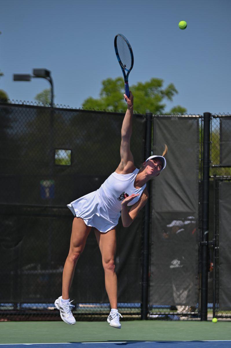 Sophomore Kristina Paskauskas serves the ball during the quarterfinal match of the ACC Championship against Notre Dame at Cary Tennis Park on Friday, April 18, 2025. The Wolfpack defeated the Fighting Irish 4-1.