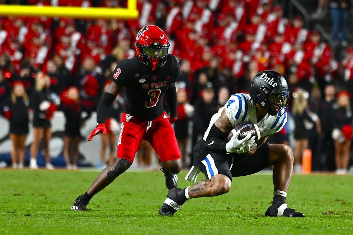 Graduate cornerback Aydan White looks to make a tackle during the football game against Duke at Carter-Finley Stadium on Saturday, Nov. 9, 2024. The Wolfpack lost to the Devils 29-19.