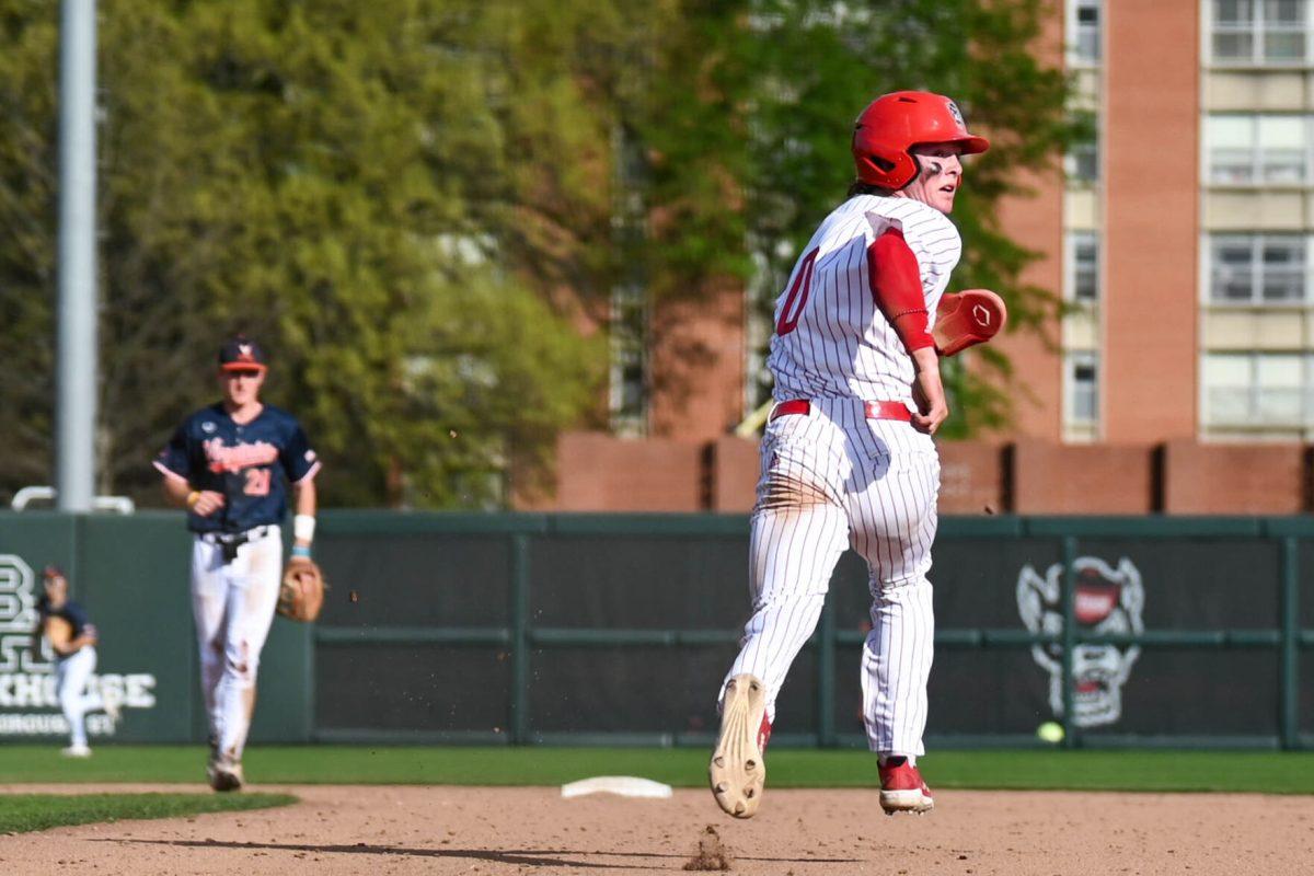 Sophomore infielder Luke Nixon makes a run towards second base during the game against Virginia at Doak Field at Dail Park on Saturday, April 5, 2025. The Wolfpack beat the Cavaliers 9-2.