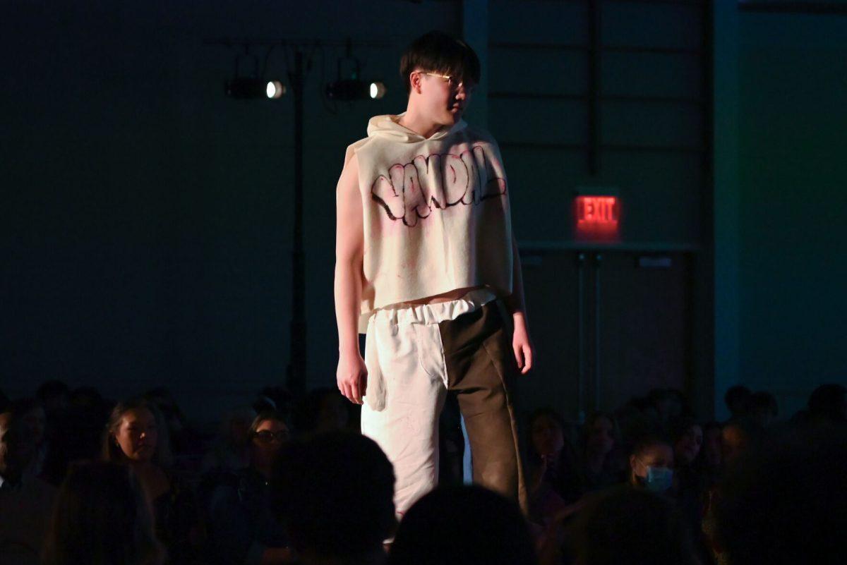 A model wears a piece displaying the name "Vandal," a collection by Celia Fennell, a third-year studying fashion and textile management, during the 27th Annual Fashion Expose at Talley Student Union on Thursday, April 10, 2025. Students, like Fennell, were given the opportunity to showcase their hard work from the semester.