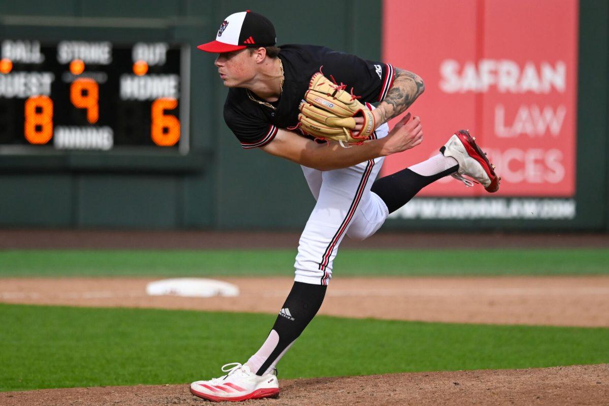 Sophomore right handed pitcher Jacob Dudan pitches the ball during the game against Virginia on April 6, 2025 at Doak Field at Dail Park. Dudan gaveup one hit through one inning and no runs. NC State beat Virginia 9-8.
