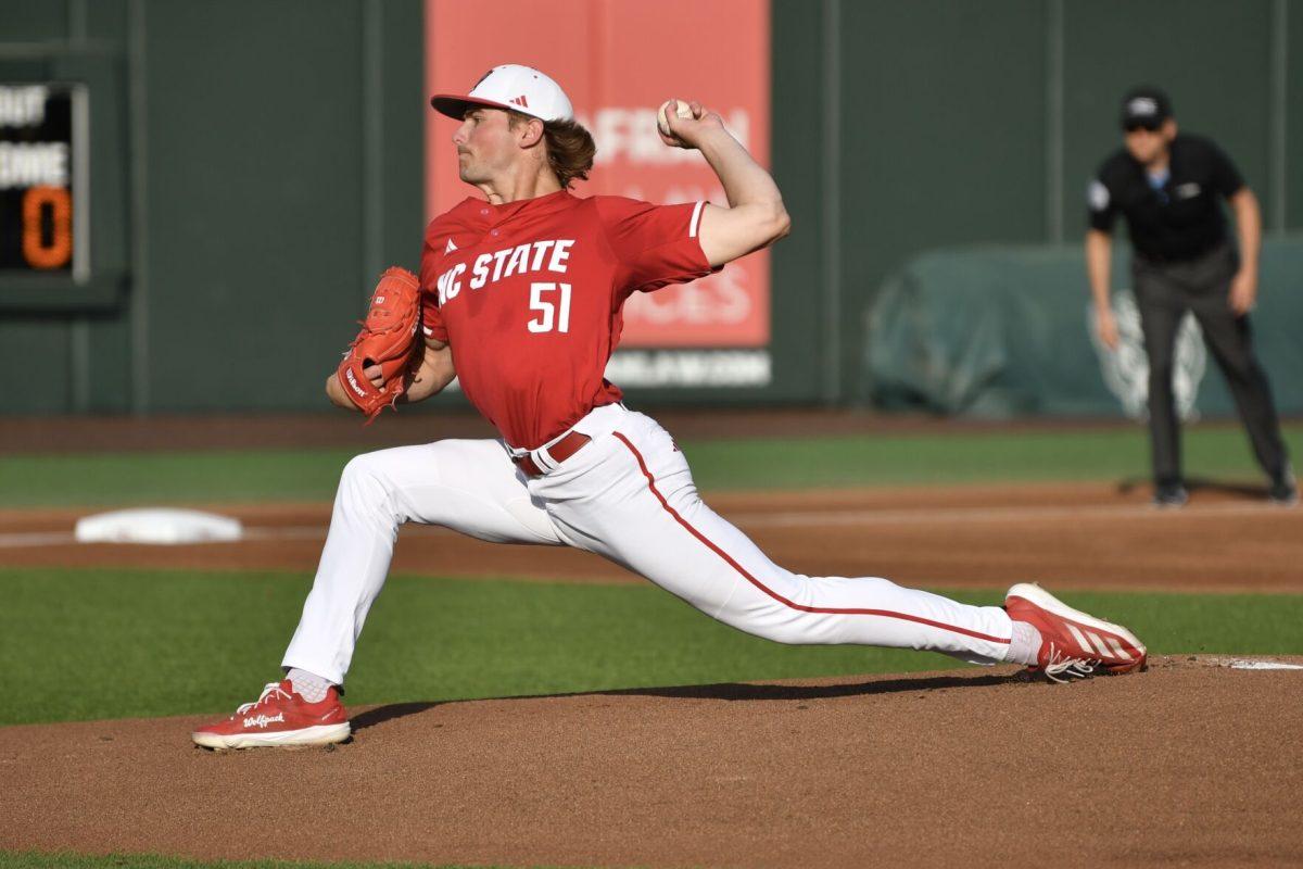 Junior starting pitcher Dominic Fritton pitches during the Wolfpack's home game against the Virginia Cavaliers on Doak Field at Dail Park on Friday, April 4, 2025. Fritton gave up five runs on 10 hits and recorded three strike outs on 5.2 innings pitched. The Cavaliers beat the Wolfpack 8-6.