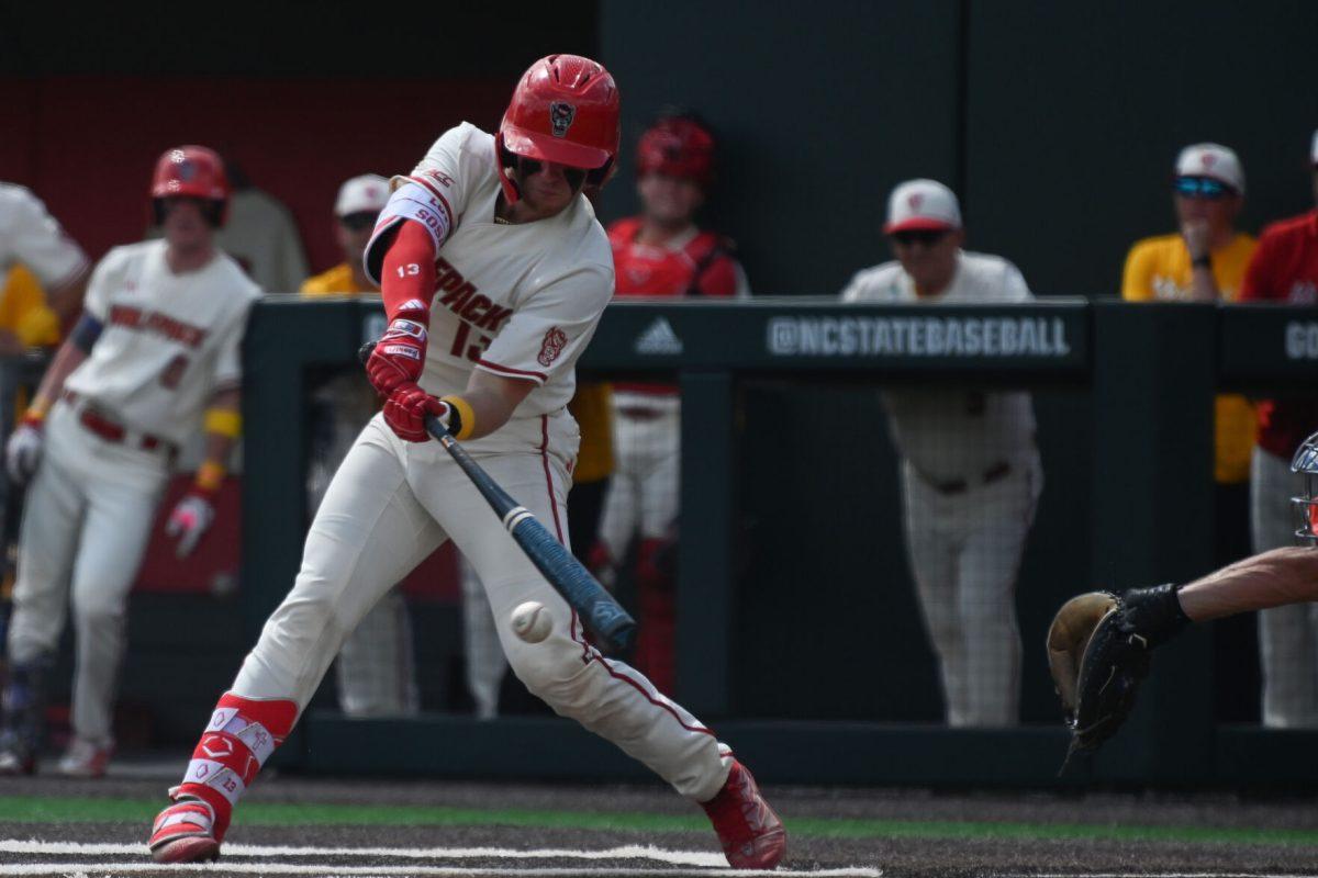 Sophomore catcher Alex Sosa hits during the Wolfpack's home game against the Clemson Tigers on Doak Field at Dail Park on April 26, 2025. Sosa recorded one run on two hits for two RBI. The Wolfpack beat the number two ranked Tigers 4-1 to complete the series sweep.