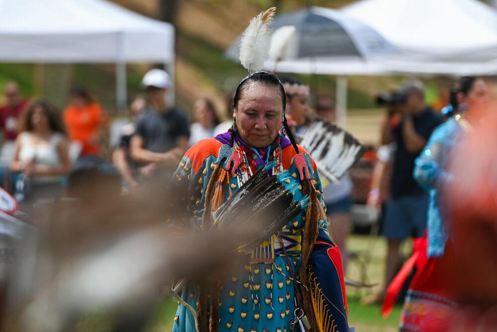 A Native performer prepares to dance alongside other women during NC State's 35th Annual Powwow at Miller Fields on Saturday, April 5, 2025. The event featured various Native vendors, performances of different Indigenous dance styles and traditional drum groups.