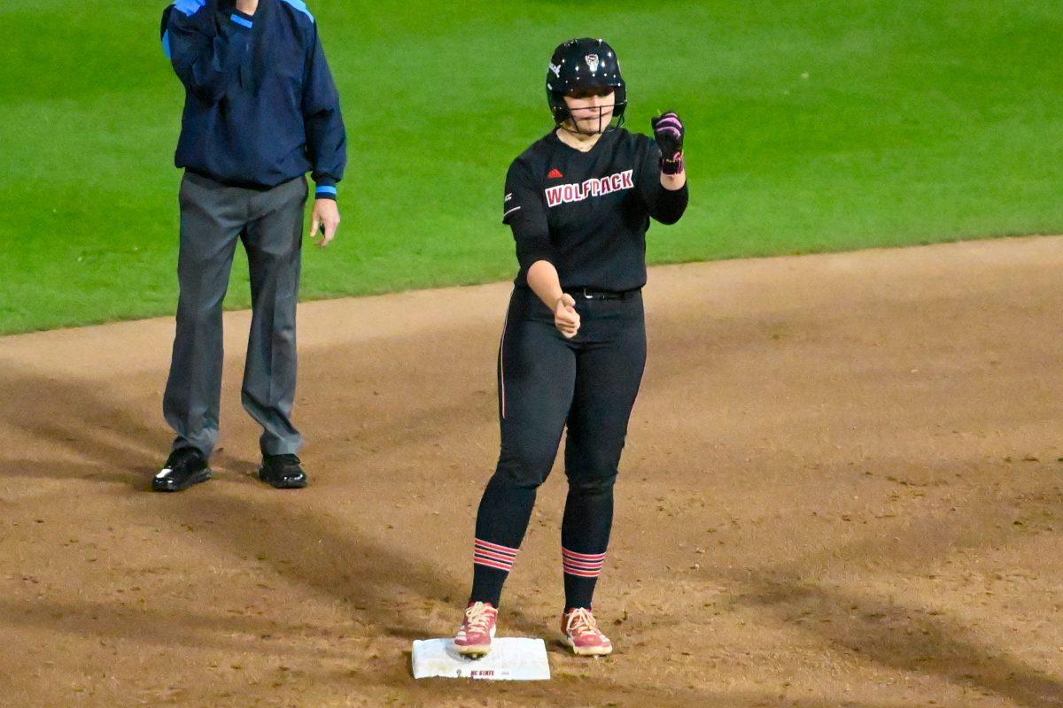Junior catcher Hannah Church dances after hitting a double during the second game of the doubleheader against Longwood at Dail Softball Stadium on Tuesday, April 15, 2025. NC State won the game 7-0. Church recorded three hits.