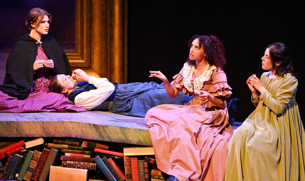 From left to right Jane Eyre, played by Quinn Kinser, Jo March, played by Zoe Wright, Cathy, played by Jayla Freeman, and Elizabeth Bennet, played by Olivia Lanza, sit and talk during a scene of the dress rehearsal of "You on the Moors Now" at Titmus Theater on Wednesday, April 2, 2025. The play offers a modern, feminist perspective on the classic novels, exploring themes of independence and growth while challenging traditional gender roles.