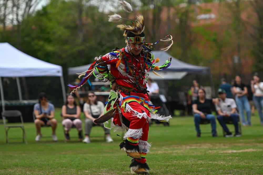A dancer perfoms a Grass Dance during NC State's 35th Annual Powwow at Miller Fields on Saturday, April 5, 2025. Powwow culture within Native communities first began as an opportunity for different tribal nations to come together and celebrate their respective identities and cultures.
