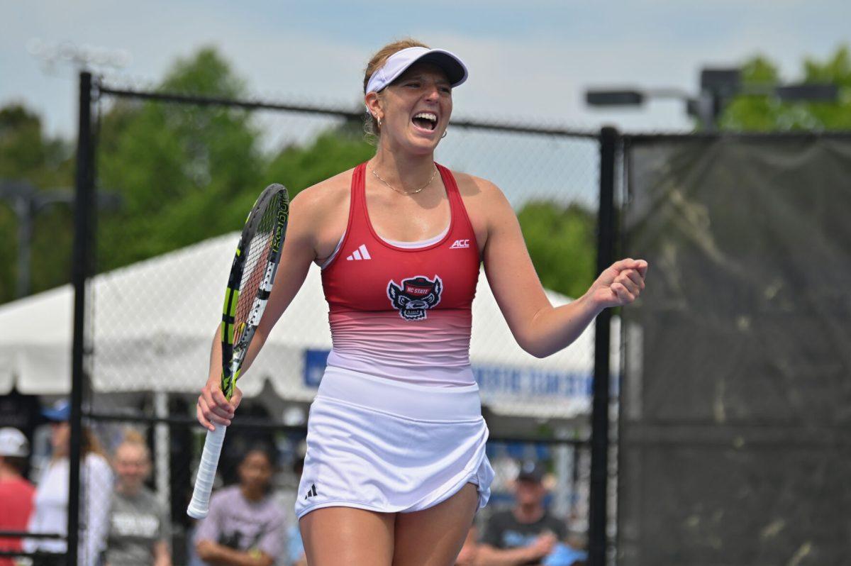 Sophomore Maddy Zampardo yells in celebration of a point during the ACC semifinals match against UNC-Chapel Hill at Cary Tennis Park on Saturday, April 19, 2025. Zampardo won her singles match 2-0. The Wolfpack fell to the Tar Heels 4-1.&#160;