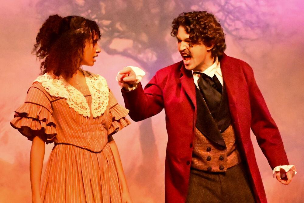 Beckett Patterson, as Heathcliff, yells at Cathy during the dress rehearsal performance of "You on the Moors" at Frank Thompson Hall on Wednesday, April 2, 2025. "You on the Moors Now" reimagines classic literary heroines as they explore themes of love, betrayal and independence.