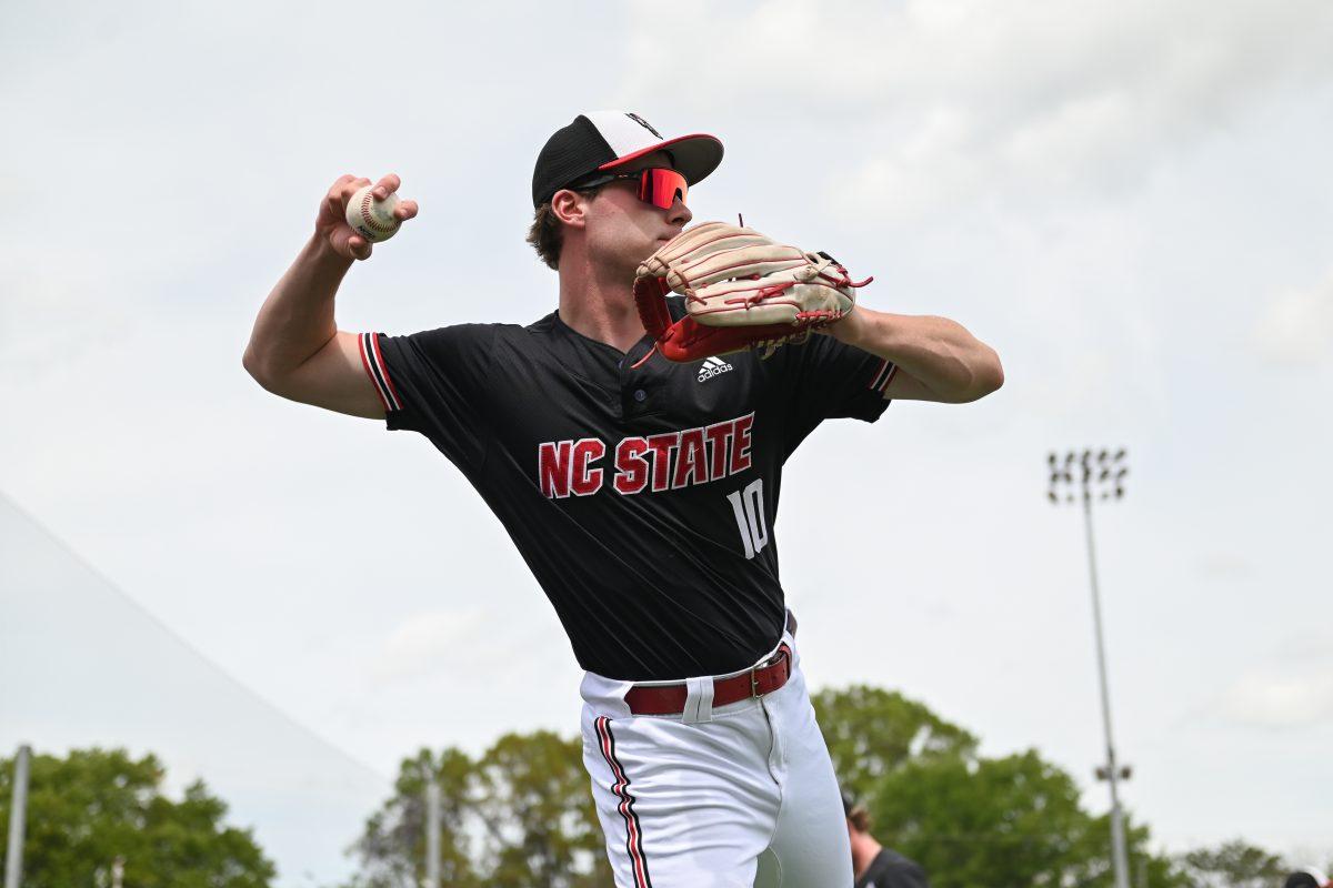 Sophomore infielder Ryan Jaros throws during warmups before the game against Virginia on April 6, 2025 at Doak Field at Dail Park. Jaros had two at bats as a pinch hitter in the final innings of the game. NC State beat Virginia 9-8.