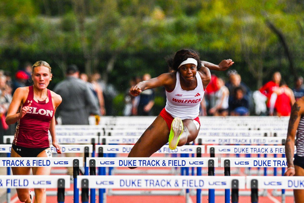 Junior thrower Jakerra Covington leaps over the hurdle in the 100m hurdles event during the Duke Invitational at the Morris Williams Stadium on Friday, April 11, 2025. Covington finished with a time of 15.08.