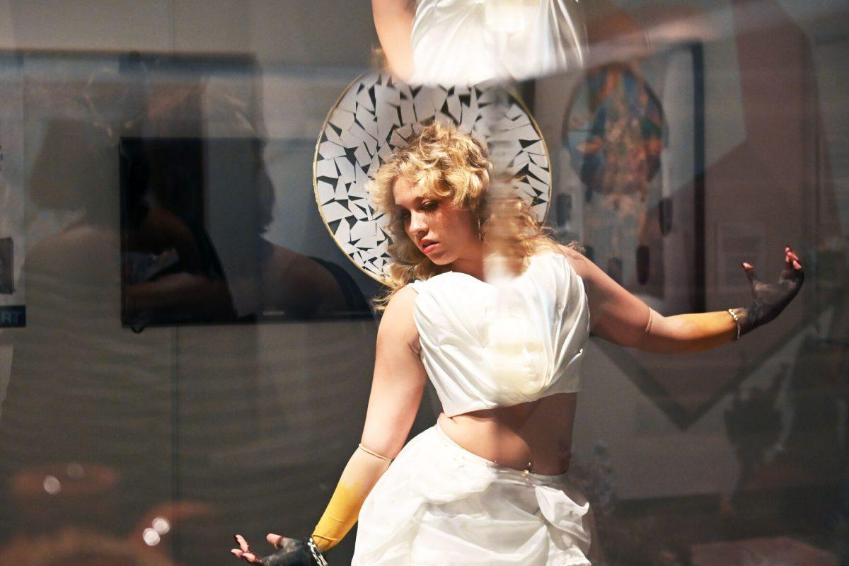 Alli Jo LaFevers, a third-year studying fashion and textile design, models &#8220;The Fall Of Icarus&#8221; designed by Mia Potter and Devyn Williams during the Art2Wear: Revive! show at the Gregg Museum of Art and Design on Thursday, April 24, 2025. The Revive! theme embraced the organization's history with the collaborative exhibit "Art2Wear: Through the Archives" and reinterpreted the runway show by having each designer showcase their work as a living exhibit.