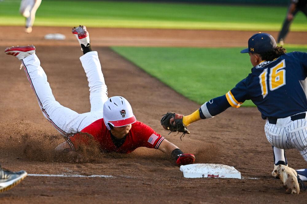 Freshman outfielder Ty Head attempts to steal third base during the game against UNC-Greensboro&#160;on Doak Field at Dail Park on Tuesday, April 1, 2025. The Wolfpack defeated the Spartans 9-6.