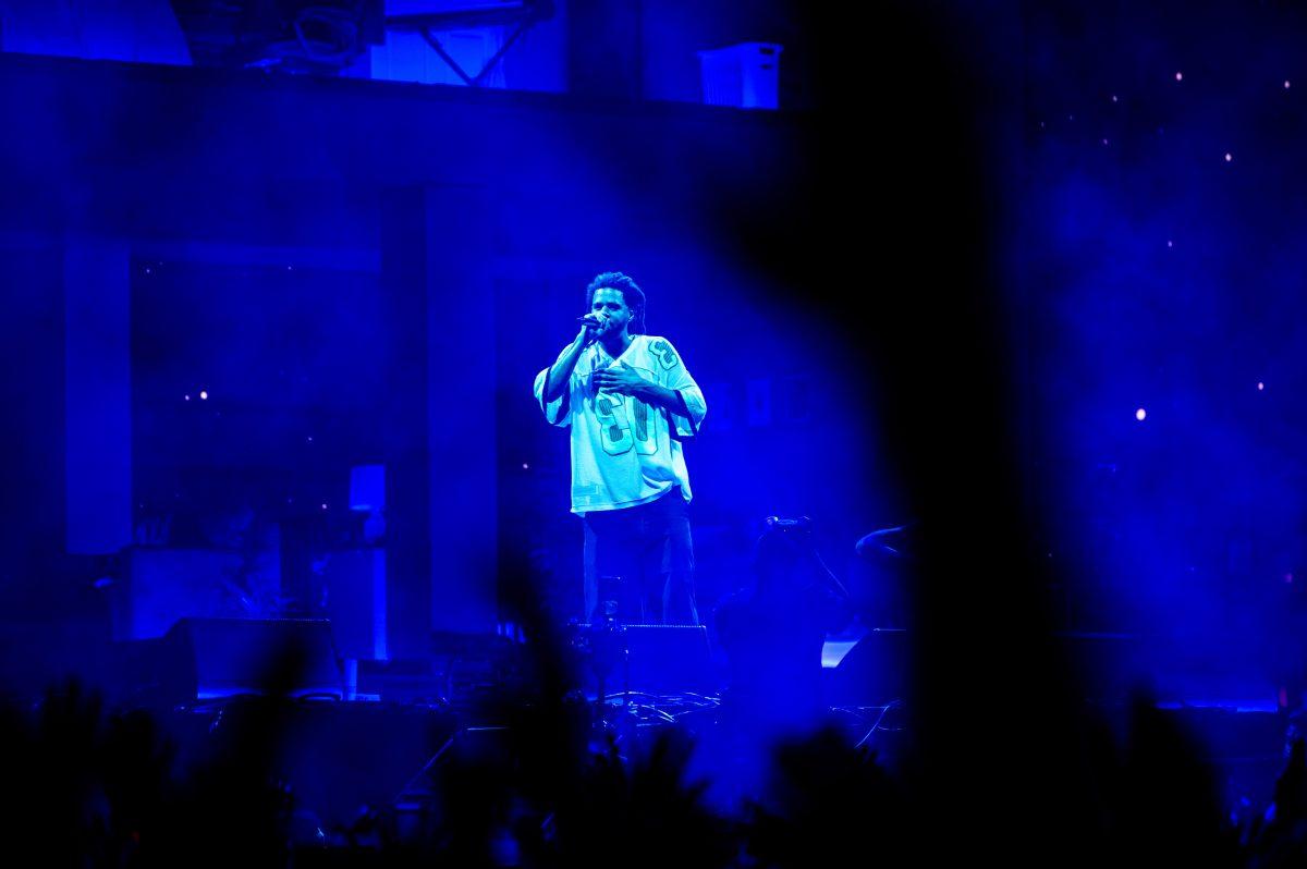 Fans raise their hands as J. Cole performs during the final Dreamville Festival in Dorothea Dix Park on April 6, 2025. Since premiering in 2018, Dreamville Festival has become one of the largest annual events in the state of North Carolina, and one of the largest music festivals in the world.