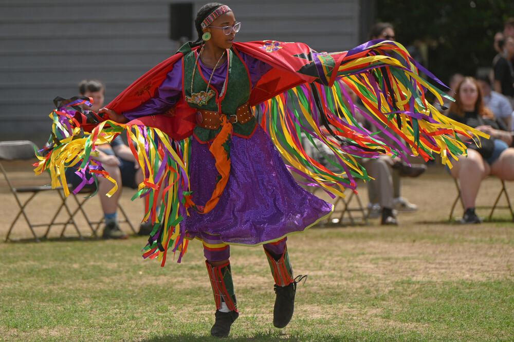 Cipher Azalea McGhee performs a Fancy Shawl Dance during NC State's 35th Annual Powwow at Miller Fields on Saturday, April 5, 2025. The event featured various Native vendors, performances of different Indigenous dance styles and traditional drum groups.