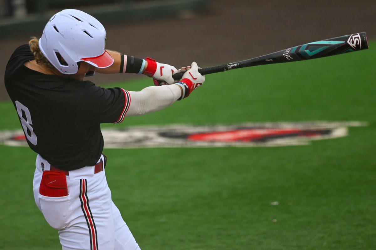 Senior infielder Justin DeCriscio swings the bat during the game against Virginia on April 6, 2025 at Doak Field at Dail Park. DeCriscio had a home run during his three at bats. NC State beat Virginia 9-8.