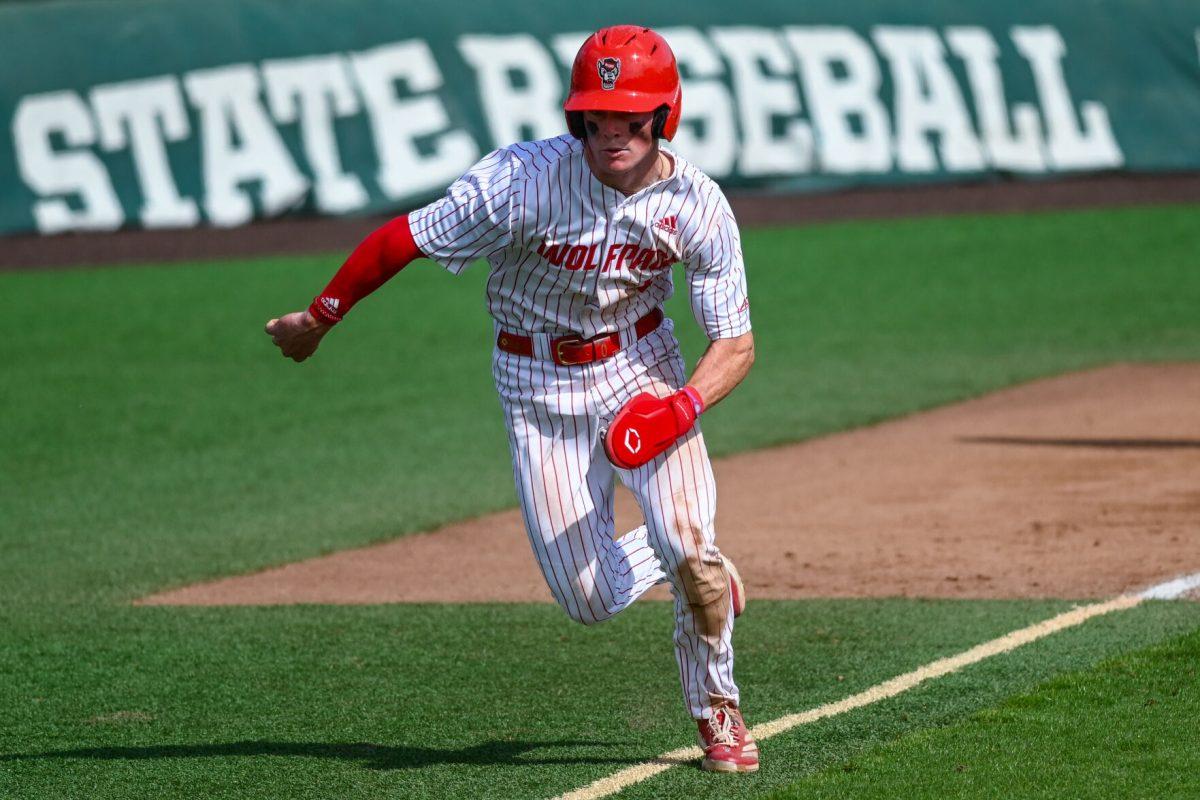 Sophomore infielder Luke Nixon runs home during the game against Virginia on April 5, 2025 at Doak Field at Dail Park. Nixon went three for three and one walk. NC State bested Virginia 9-2.