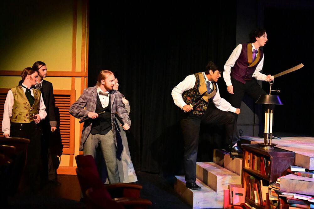 Performers prepare to fight during the dress rehearsal performance of "You on the Moors" at Frank Thompson Hall on Wednesday, April 2, 2025. "You on the Moors Now" reimagines classic literary heroines as they explore themes of love, betrayal and independence.