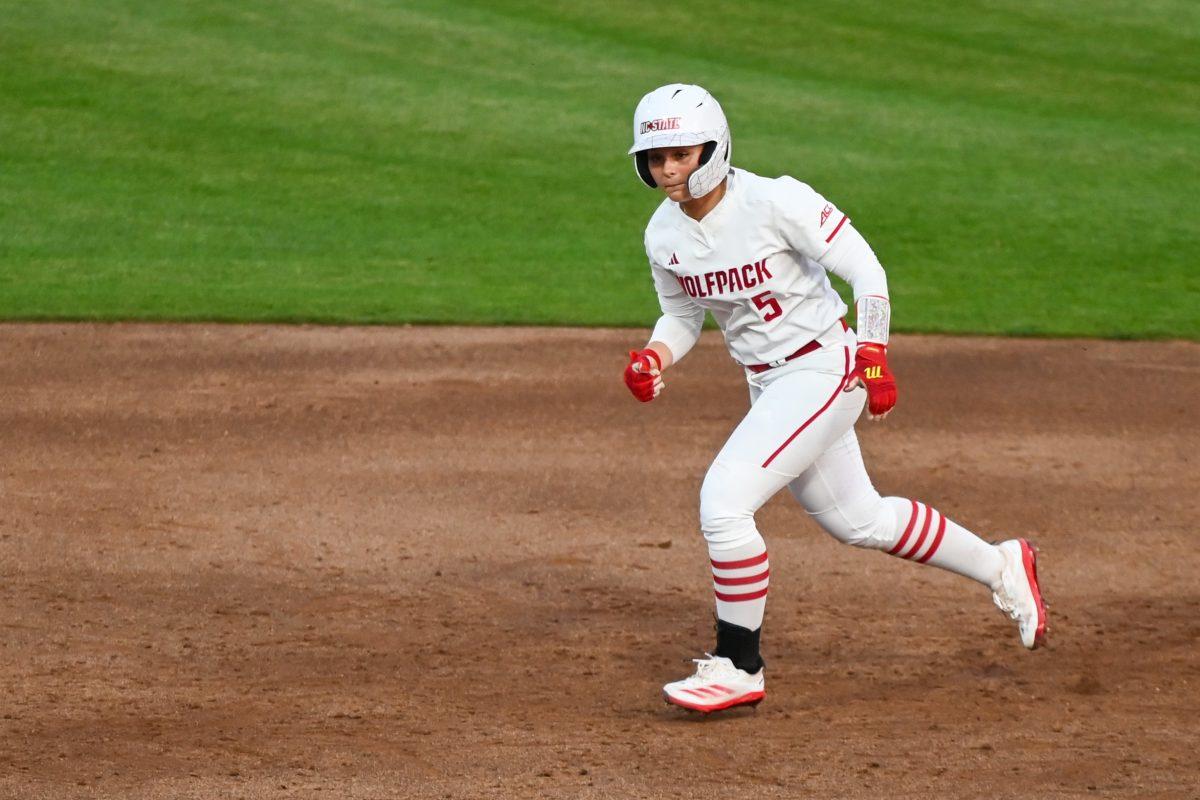 Freshman infielder Kendall Simmers runs to third base during the game against Virginia Tech at Dail Softball Stadium on Friday, April 5, 2025. Simmers hit a homreun. NC State lost the game 10-2.
