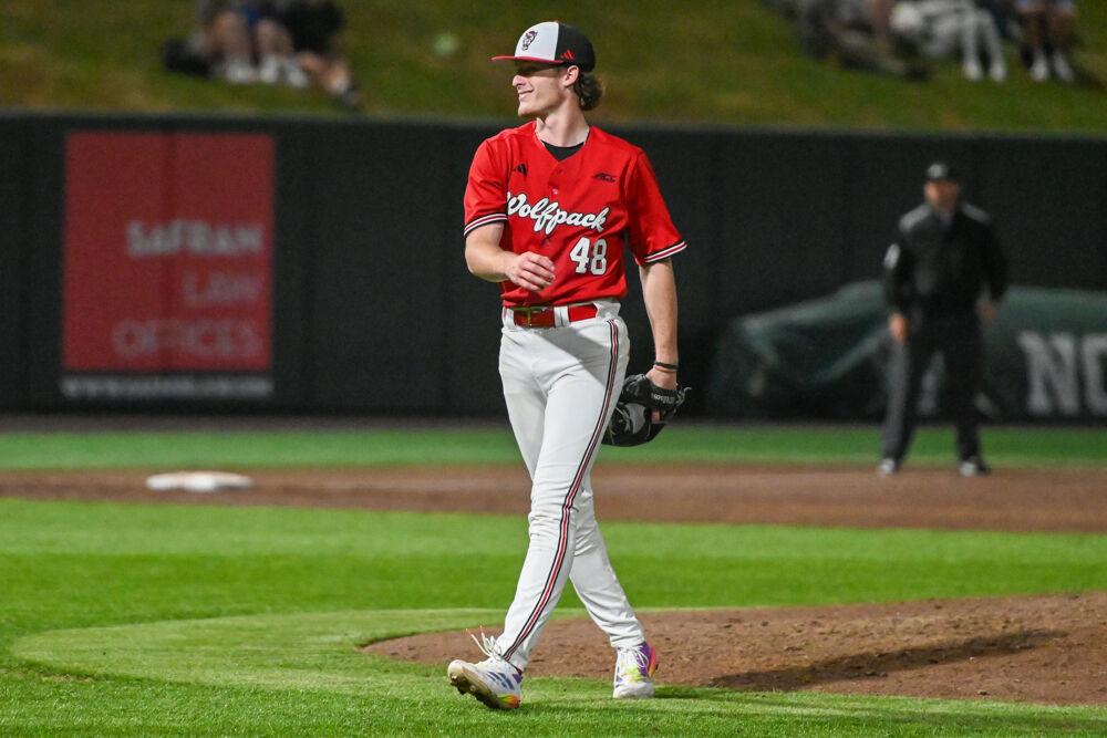 Junior pitcher Andrew Shaffner smiles after striking out a batter during the game against UNC-Greensboro on Doak Field at Dail Park on Tuesday, April 1, 2025. The Wolfpack defeated the Spartans 9-6.