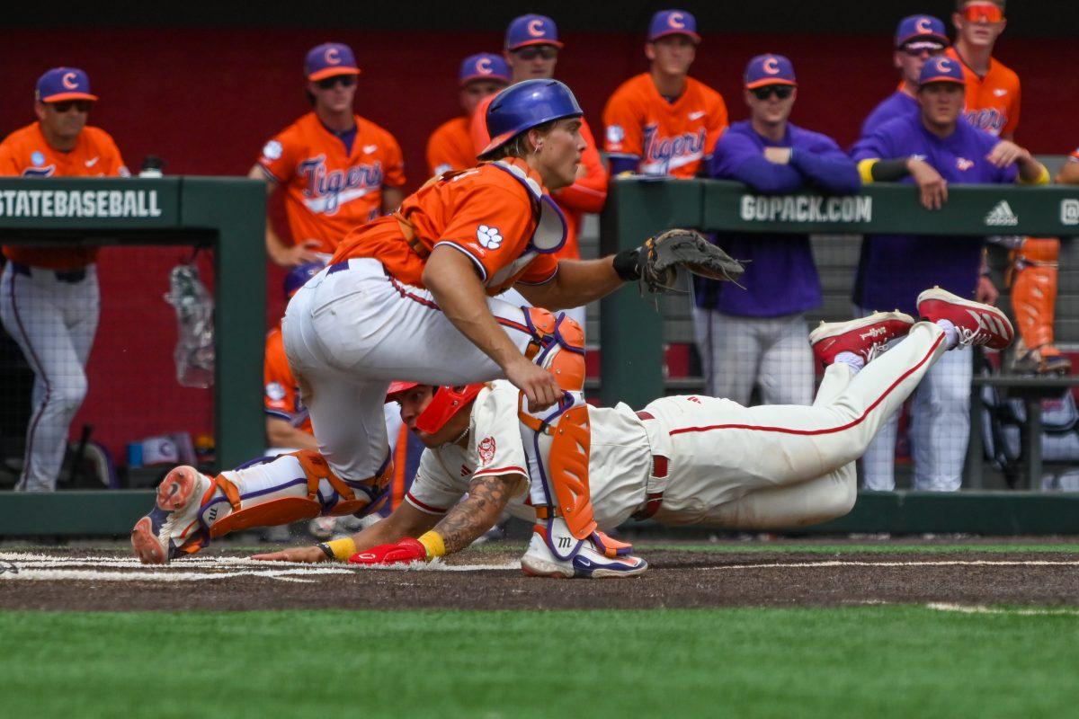 Sophomore outfielder Jet Gilliam slides home during the game against Clemson at Doak Field at Dail Park&#160;on Saturday, April 26, 2025. NC State beat Clemson 4-1.