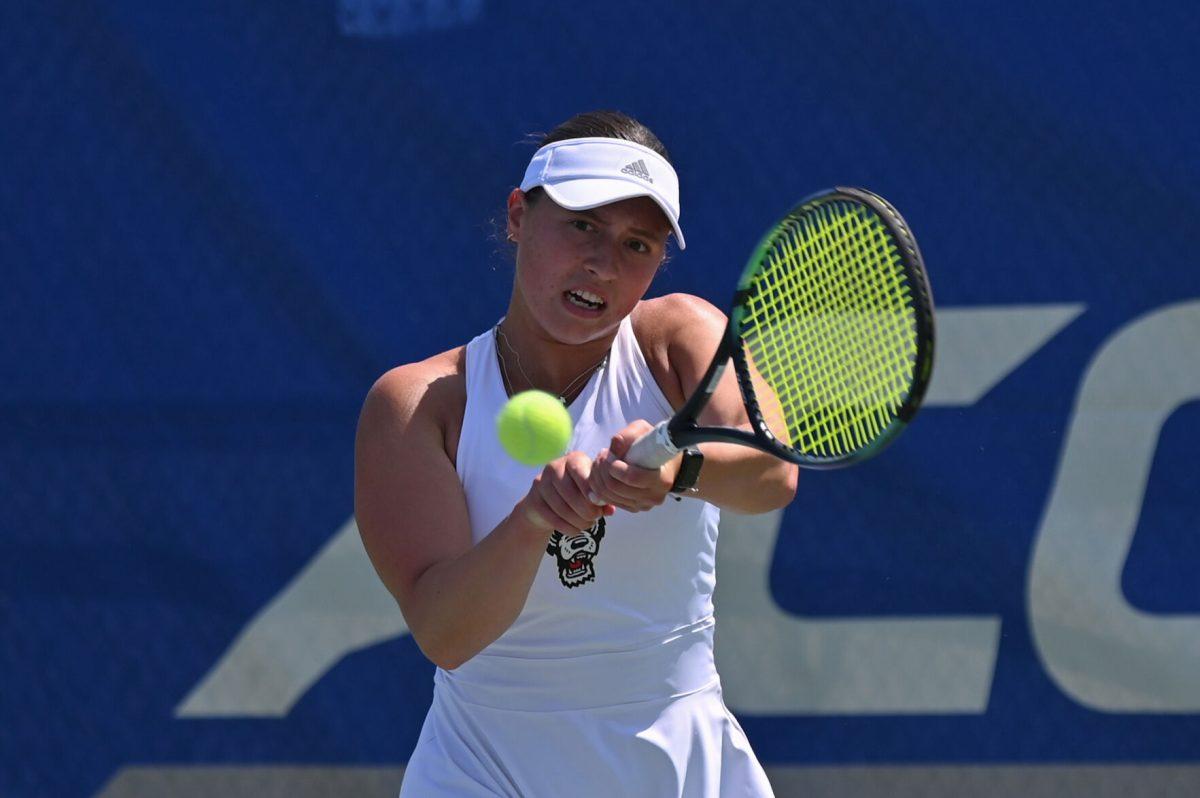 Junior Anna Zyryanova backhands the ball during the quarterfinal match of the ACC Championship against Notre Dame at Cary Tennis Park on Friday, April 18, 2025. The Wolfpack defeated the Fighting Irish 4-1.