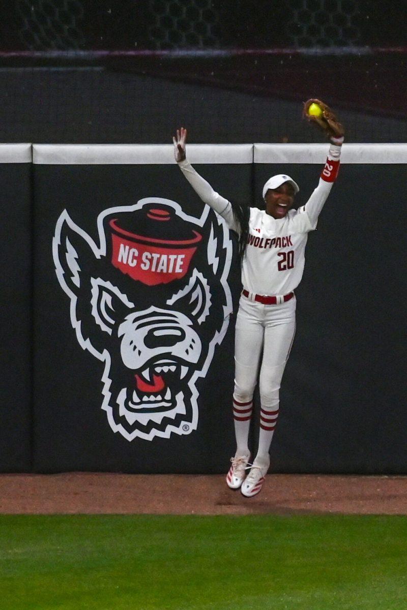 Junior utility player MaKayla Marbury smiles after catching a hit during the game against Virginia Tech at Dail Softball Stadium on Friday, April 5, 2025. Marbury was at bat twice. The Wolfpack lost to the Hokies 10-2.