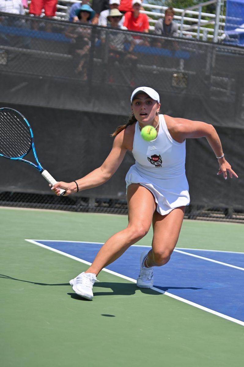 Sophomore Gabriella Broadfoot lunges for a short ball during the quarterfinal match of the ACC Championship against Notre Dame at Cary Tennis Park on Friday, April 18, 2025. The Wolfpack defeated the Fighting Irish 4-1.