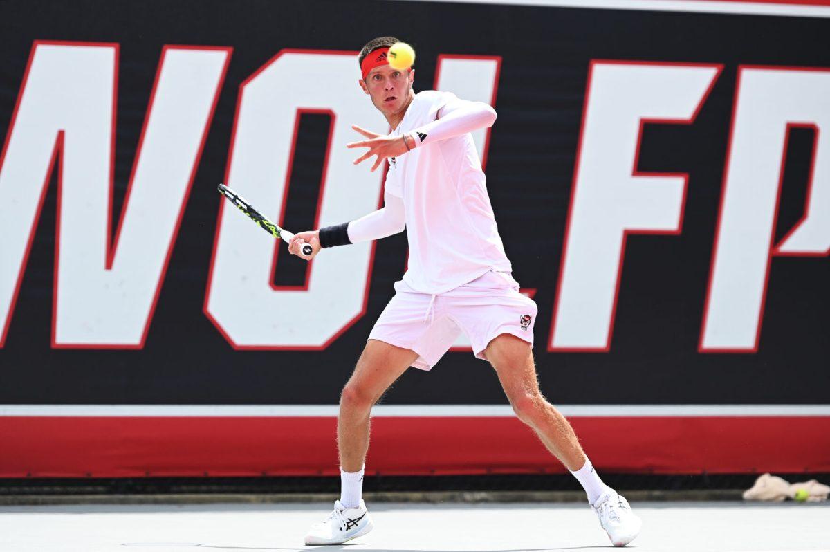 Freshman Nikolay Nedelchev prepares to return the ball during the NCAA first round match versus South Carolina State at J.W. Isenhour Tennis Center on Saturday, May 3, 2025. Borisiouk and Nedelchev won their doubles match 6-1. Nedelchev won his singles match 2-0 (6-1, 6-2). The Wolfpack beat the Bulldogs 4-0.