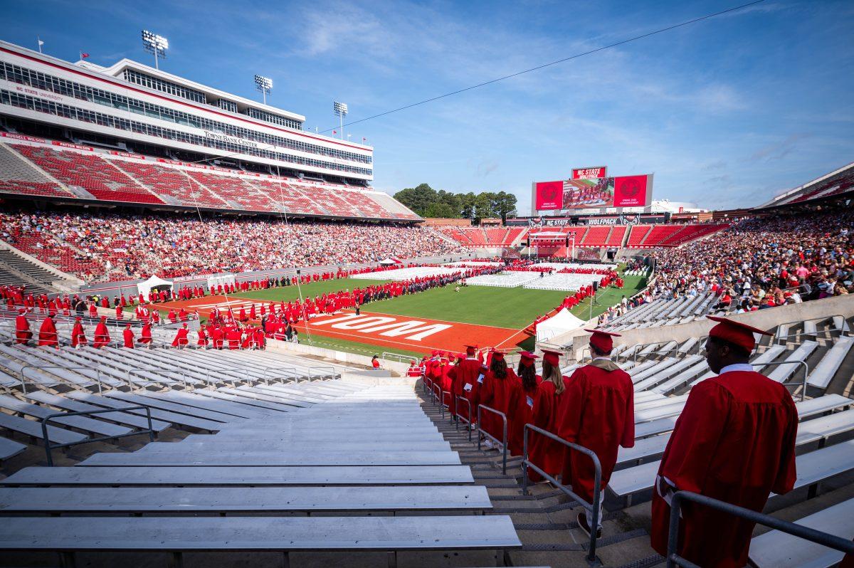 Graduating undergraduate students file into their seats before the University Commencement ceremony in Carter-Finley Stadium on Saturday, May 3, 2025. NC State conferred 7,234 degrees at the ceremony, including 5,079 bachelor’s, 1,783 master’s, 306 doctoral, and 66 associate degrees.