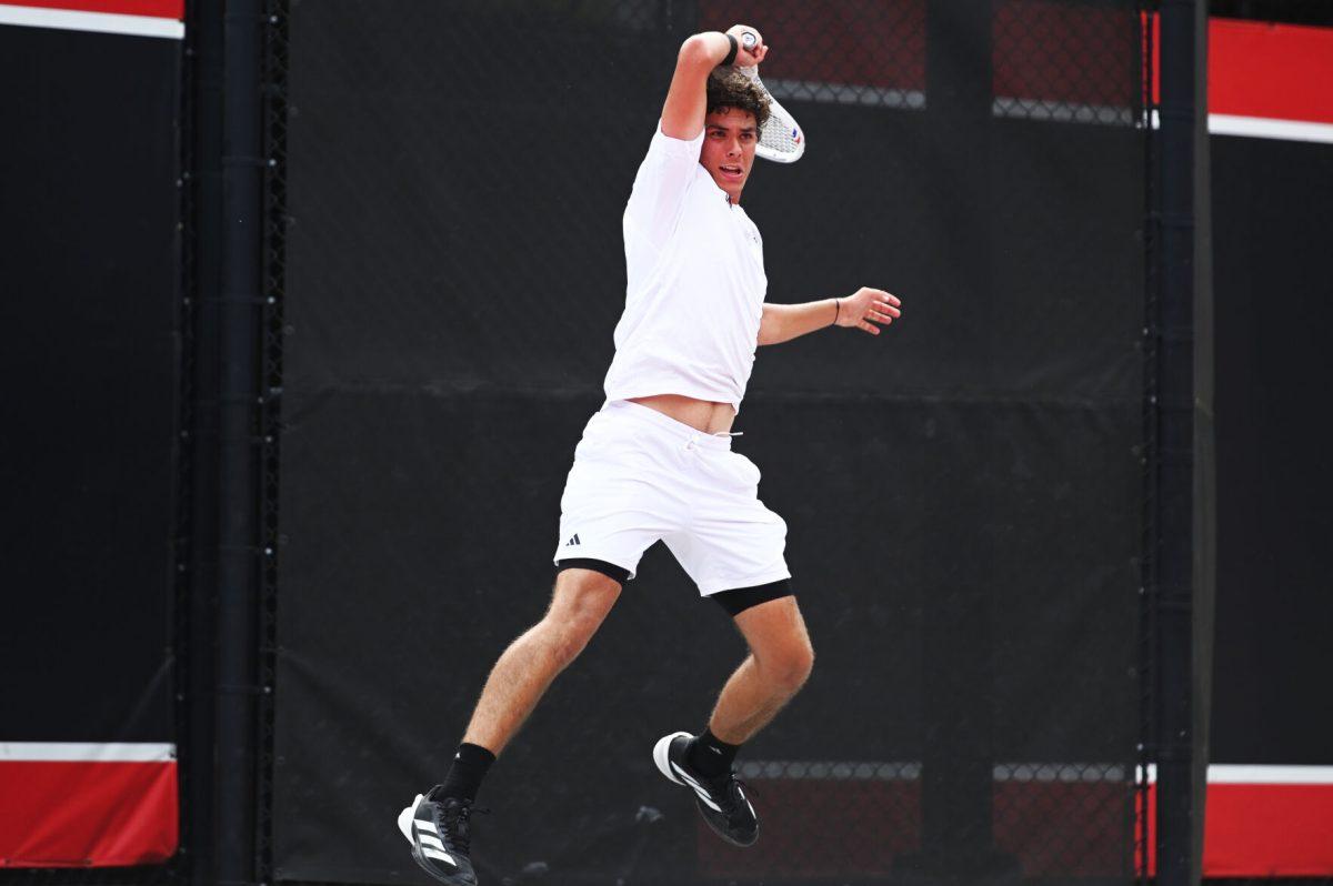 Redshirt freshman Jules Leroux follows through during the NCAA first round match versus South Carolina State at J.W. Isenhour Tennis Center on Saturday, May 3, 2025. Leroux won his singles match 2-0 (6-4, 6-2). The Wolfpack beat the Bulldogs 4-0.