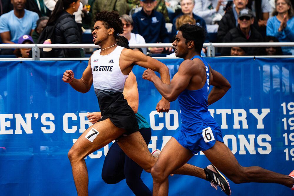 Sophomore sprinter Xavier Branker pushes himself to the finish line during the Duke Invitational at the Morris Williams Track on Friday, April 10, 2025. Branker finished second in his heat and tenth overall in the 400m with a time of 47.50.