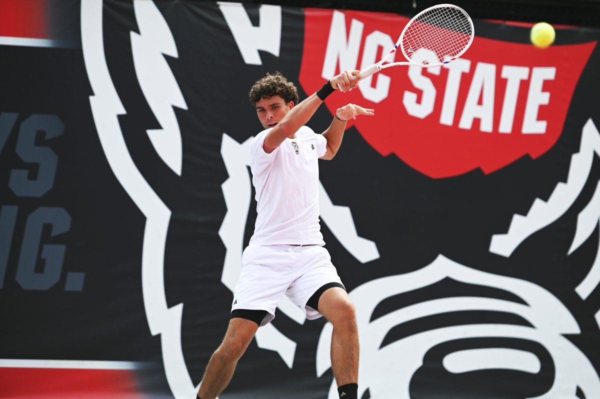 Redshirt freshman Jules Leroux returns the ball during the NCAA first round match versus South Carolina State at J.W. Isenhour Tennis Center on Saturday, May 3, 2025. Leroux won his singles match 2-0 (6-4, 6-2). The Wolfpack beat the Bulldogs 4-0.
