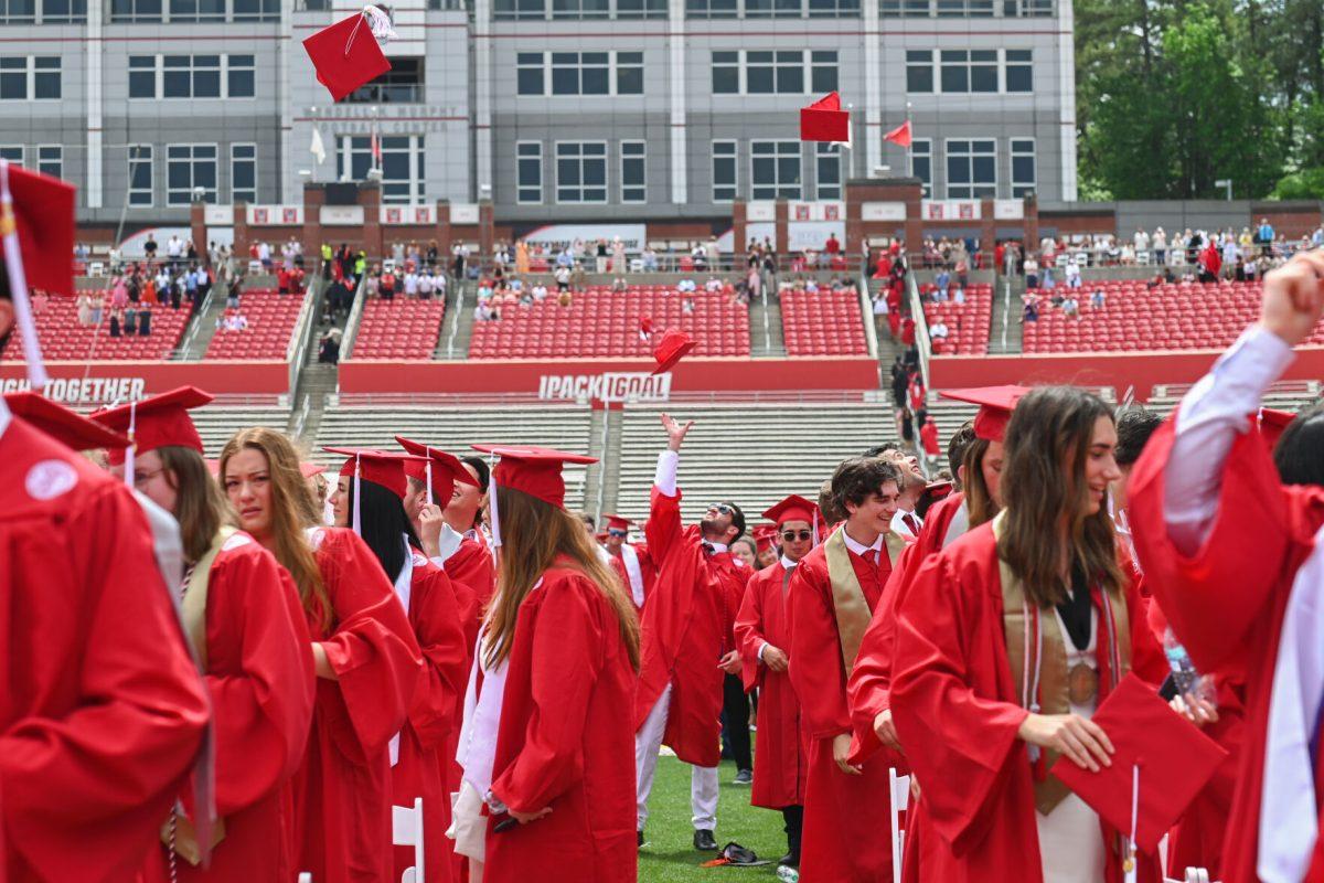 Students throw their caps at the end of the Spring Commencement Ceremony at Carter-Finley Stadium on May 3, 2025. 7,234 degrees were conferred at the ceremony, including 5,079 bachelor&#8217;s, 1,783 master&#8217;s, 306 doctoral and 66 associate degrees.