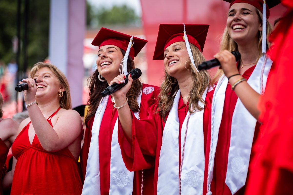 The Ladies in Red sing the alma mater during the University Commencement ceremony in Carter-Finley Stadium on Saturday, May 3, 2025. NC State conferred 7,234 degrees at the ceremony, including 5,079 bachelor&#8217;s, 1,783 master&#8217;s, 306 doctoral, and 66 associate degrees.