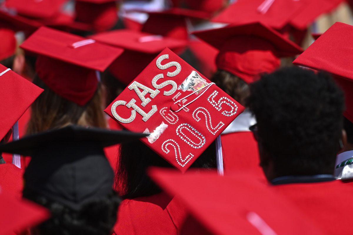 Decorated graduation caps on display during the Spring Commencement Ceremony at Carter-Finley Stadium on May 3, 2025.