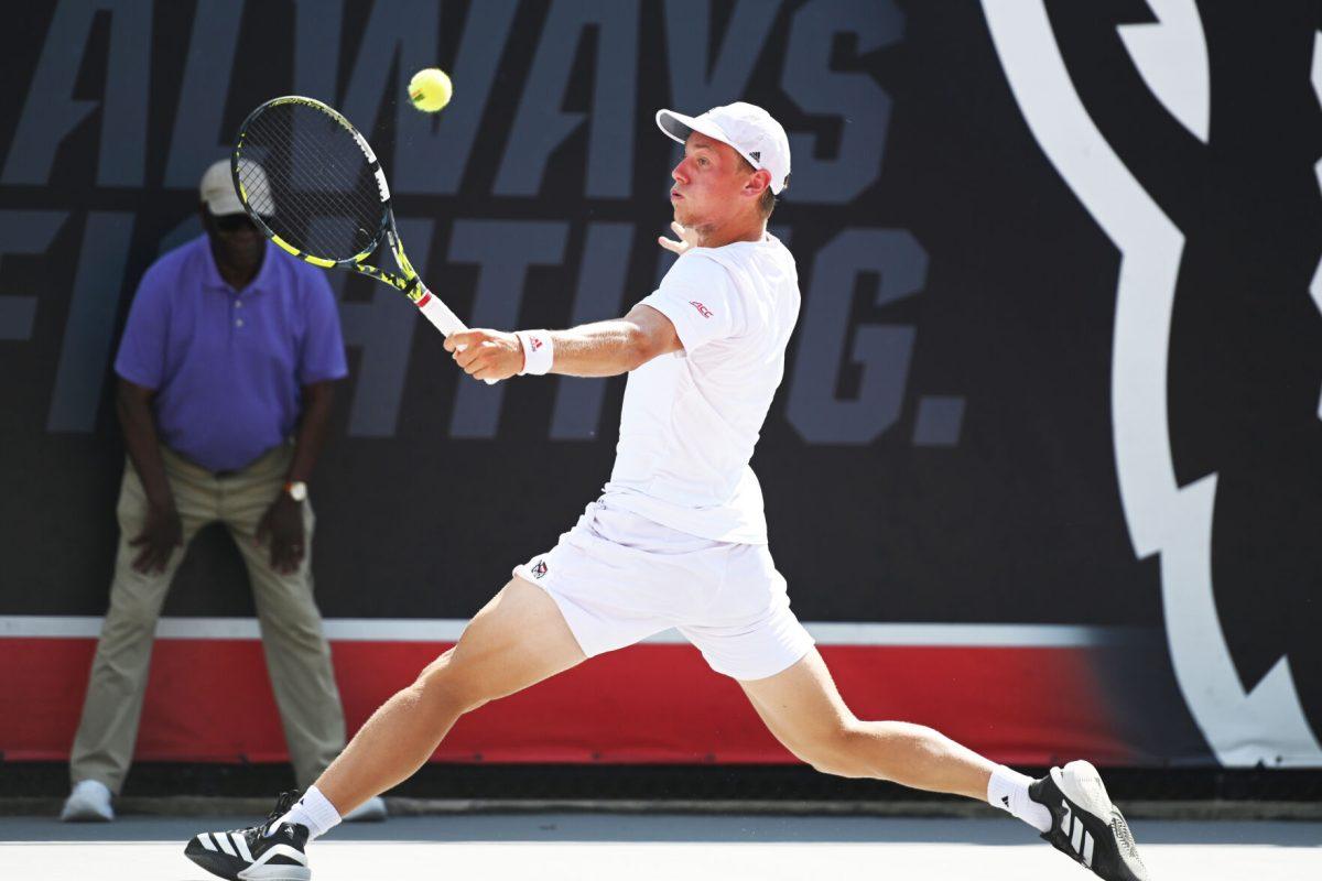 Senior Fons Van Sambeek races for the ball during the NCAA first round match versus South Carolina State at J.W. Isenhour Tennis Center on Saturday, May 3, 2025. Manning and Van Sambeek won their doubles match 6-0. The Wolfpack beat the Bulldogs 4-0.