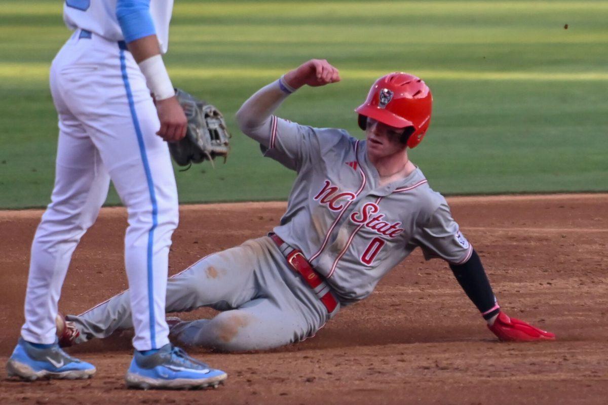 Sophomore infielder Luke Nixon slides into third during the game against UNC at Boshamer Stadium on Friday, May 9, 2025. Nixon scored two runs. NC State beat UNC 8-5.