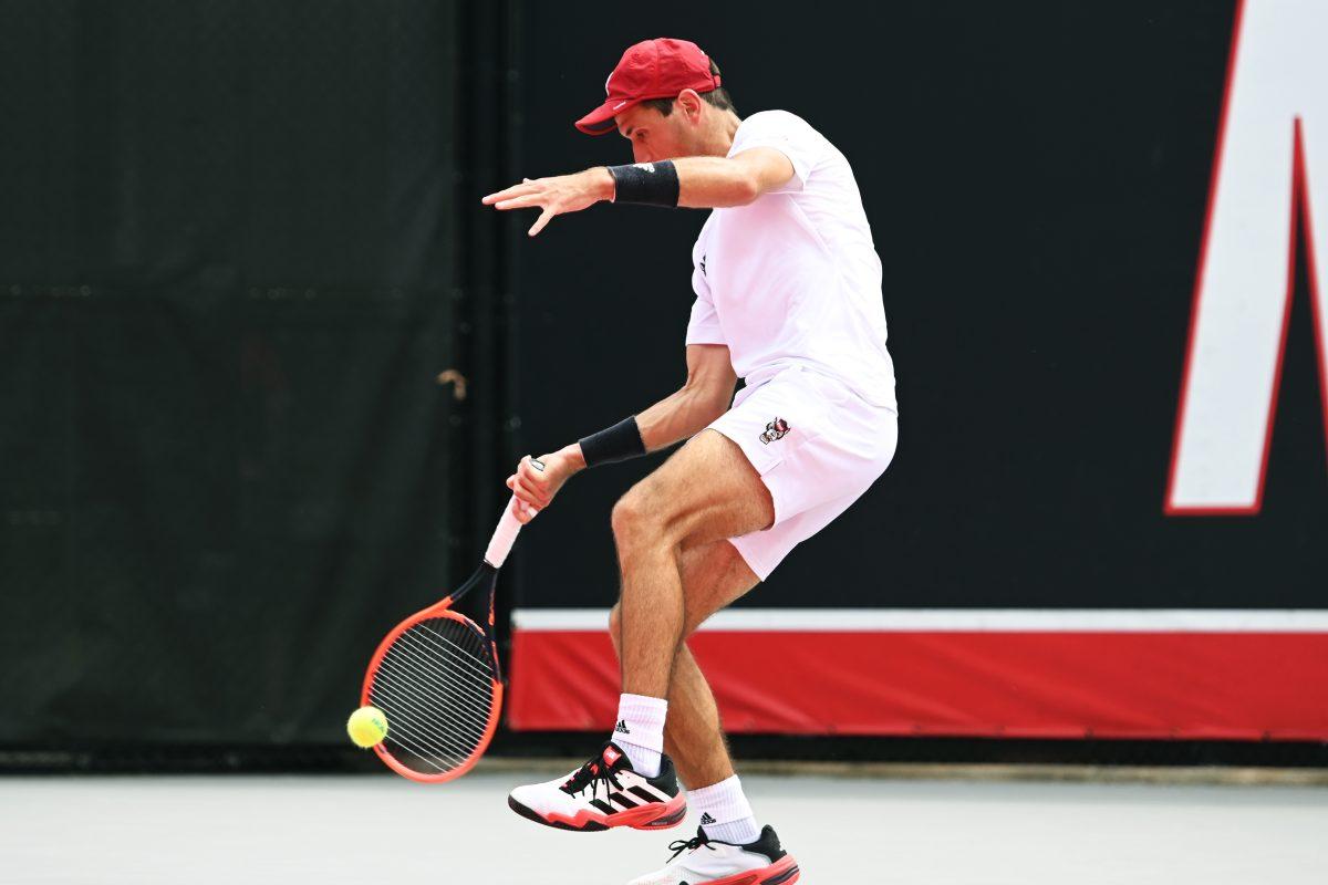 Senior Luca Staeheli returns the ball during the NCAA first round match versus South Carolina State at J.W. Isenhour Tennis Center on Saturday, May 3, 2025. Staeheli won his singles match 2-0 (6-1, 6-1). The Wolfpack beat the Bulldogs 4-0.