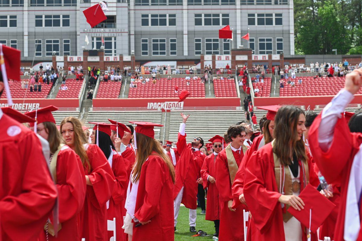 Students throw their caps at the end of the Spring Commencement Ceremony at Carter-Finley Stadium on May 3, 2025. 7,234 degrees were conferred at the ceremony, including 5,079 bachelor&#8217;s, 1,783 master&#8217;s, 306 doctoral and 66 associate degrees.
