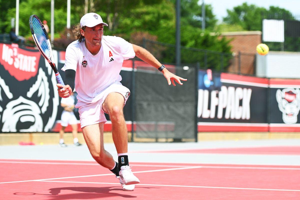 Junior Martin Borisiouk races for the ball during the NCAA first round match versus South Carolina State at J.W. Isenhour Tennis Center on Saturday, May 3, 2025. Borisiouk and Nedelchev won their doubles match 6-1. The Wolfpack beat the Bulldogs 4-0.