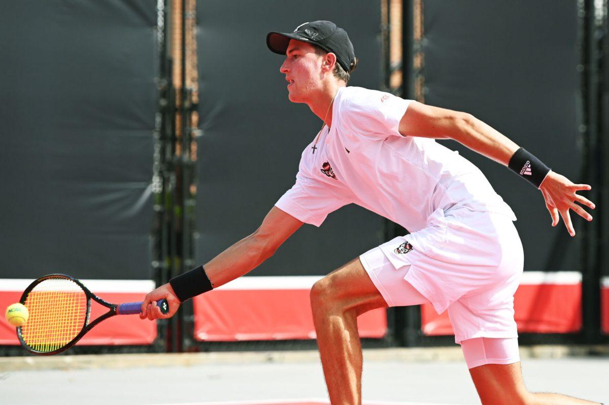 Redshirt freshman William Manning lunges for the ball during the NCAA first round match versus South Carolina State at J.W. Isenhour Tennis Center on Saturday, May 3, 2025. Manning and Van Sambeek won their doubles match 6-0. The Wolfpack beat the Bulldogs 4-0.