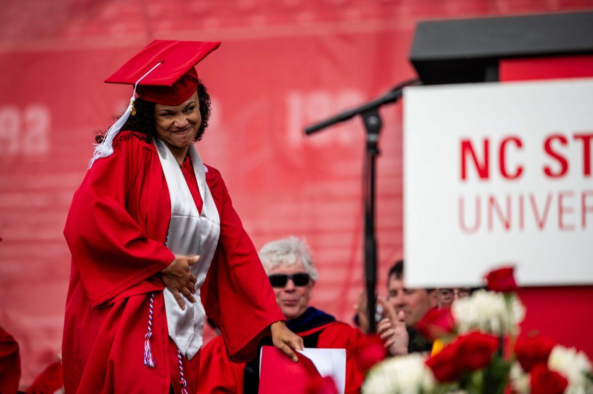 Terrica Lewis, a fourth-year graduating with a degree in communication media, makes a face after being recognized as the student speaker during the University Commencement ceremony in Carter-Finley Stadium on Saturday, May 3, 2025. NC State conferred 7,234 degrees at the ceremony, including 5,079 bachelor&#8217;s, 1,783 master&#8217;s, 306 doctoral, and 66 associate degrees.