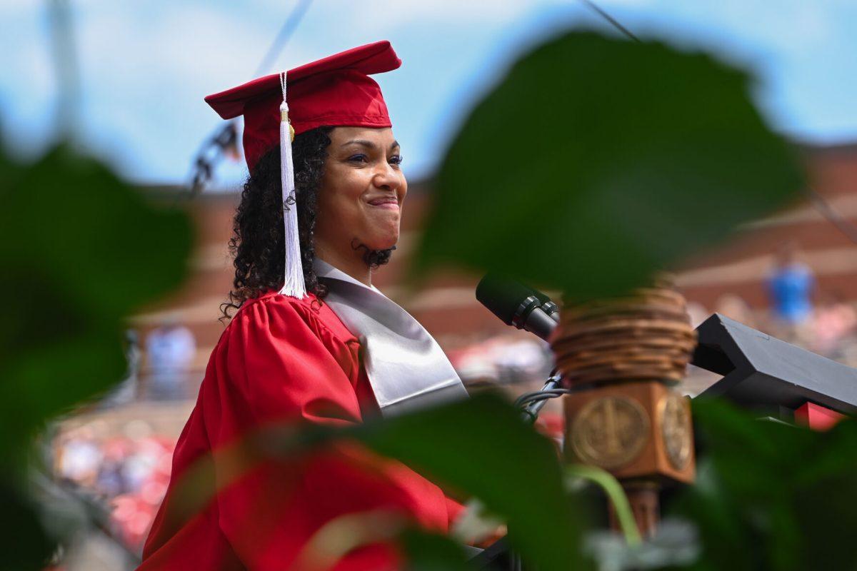 Student speaker Terrica Lewis, graduating with a bachelor's of arts in communication, addresses fellow graduates during the Spring Commencement Ceremony at Carter-Finley Stadium on May 3, 2025. Lewis, a U.S. Navy veteran closed her speech with a call to action, saying "Now, let's go think and do something extraordinary!"